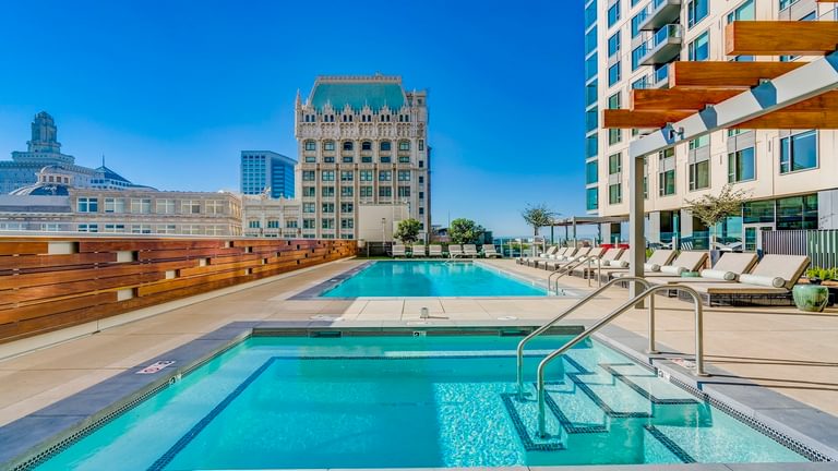 17th Broadway Apartments pool with skyline view GW