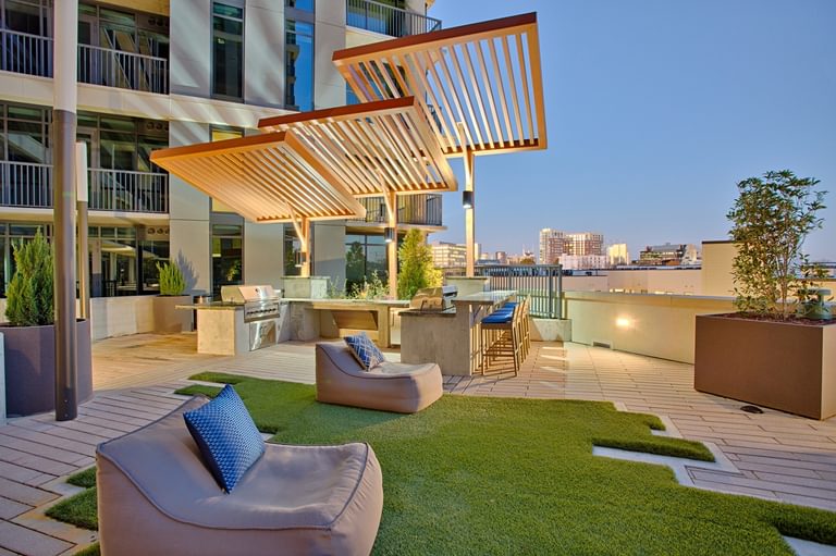 The Morris 7th Floor Terrace with chairs at dusk